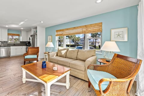 Sand Dollar Living Room with natural sunlight and slider doors to Patio