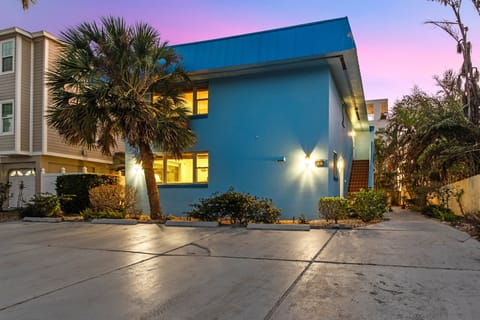 Front of Unit at twilight with parking area shown