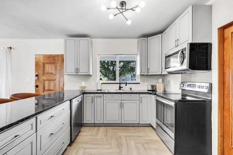 Culinary dreams come true in this sleek, fully equipped kitchen.