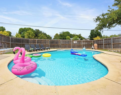 Pool with loungers and floaties - perfect for cooling off & relaxing on any day