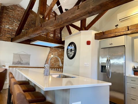 Comfortable barstools at a fully equipped kitchen!