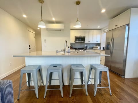 Hang out at the hightop seating with stemmed wine glasses, whiskey glass, and more.