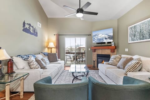 Vacation Rentals in Park City at Bear Hollow Lodges 1403: Living room with Queen sofa bed, gas fireplace and private balcony access
