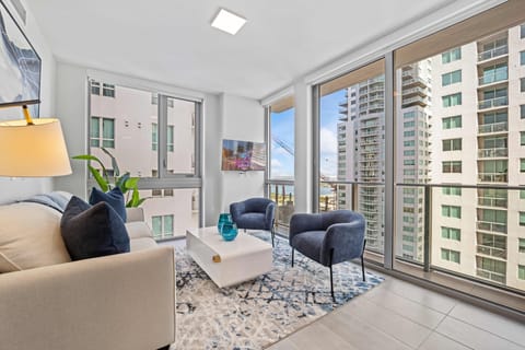 Living area with magnificent city view and Smart TV
