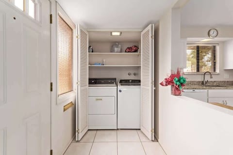 Convenient laundry area with a washer and dryer, making longer stays a breeze.