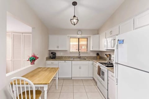Fully stocked kitchen with all the modern appliances for your cooking convenience.