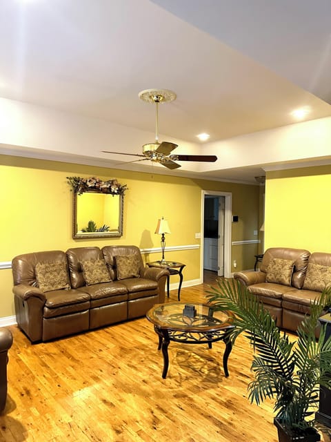 Living/ Entertainment Room with Big screen television, Fireplace, and WiFi. 