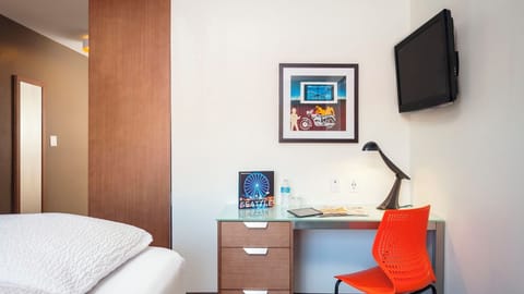 Settle in at the bright desk to plan, work, and recharge.