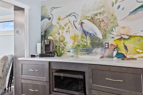 Cups and condiments can be found in drawer right under Keurig.