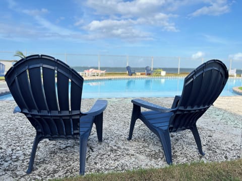 Lounge by the pool and the beach