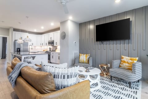 Cozy couch + big screen

