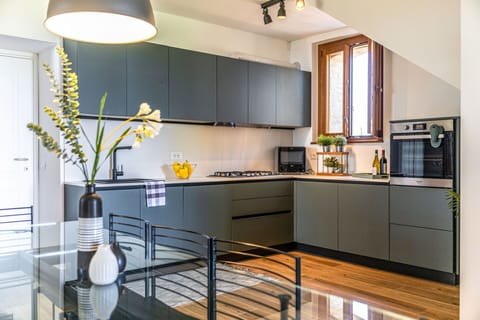 Kitchen, Interior Design, Furniture, Countertop, Cabinetry, Kitchen Appliance, Flooring, Light Fixture, Home, Major Appliance