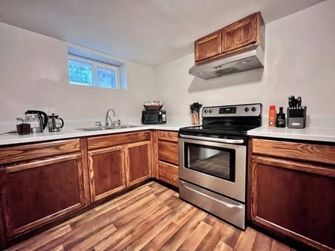 The eat-in kitchen offers a full-sized range and fridge, microwave, toaster oven, and the usual assortment of essential tools, spices, and oils needed for meal prep and includes coffee & tea for lovely, lazy mornings.