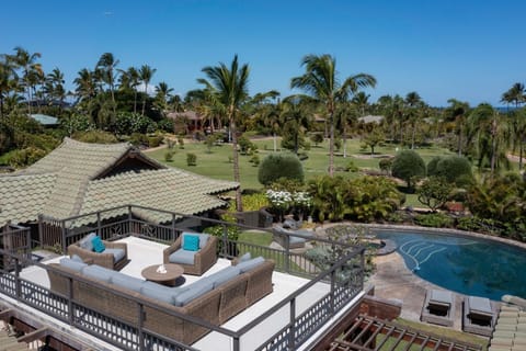 Soak in ocean, mountain, and garden views from your private rooftop lounge.