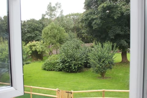 The twin room overlooks the mature walled gardens.