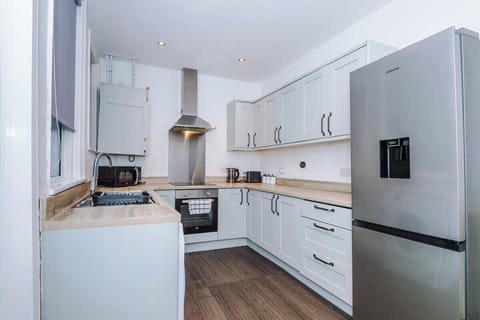 Includes oven, kettle, toaster, and all essential cookware.