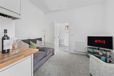 Seating area showing smart tv