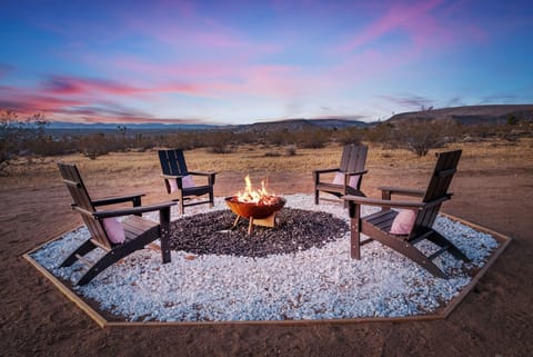 Gather for s’mores and stargazing around the cozy fire pit.