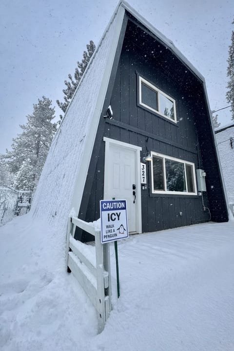 Steel roof A-frame cabin