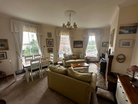 Sea views from all windows. TV and fireplace, WIFI. Dining Table adjacent. Two settees and additional seating at the dining table