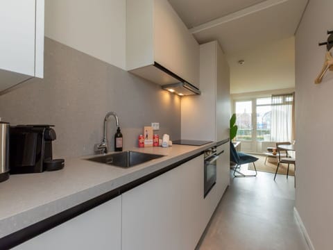 Apartment, Residential Area, Condominium, Commercial Building, Mixed-Use, Parking, Family Car, Balcony, Brutalist Architecture