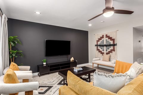 Cozy living room with a 65" Smart TV