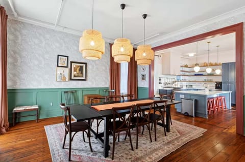 Open dining space flowing into the kitchen, perfect for hosting family dinners or group celebrations.