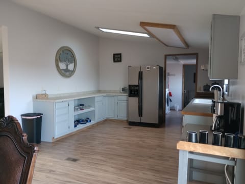 Coffee and tea bar with 14 cup Cuisinart coffee maker and Keurig.