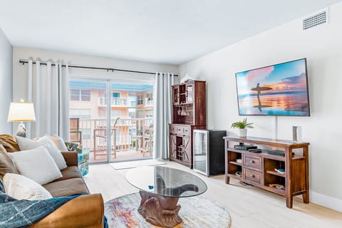 Relax in a vibrant living room with stunning views and a widescreen TV!