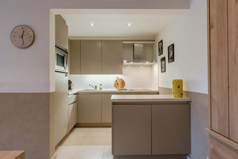 Stylish bathroom with large mirror and refreshing shower.
