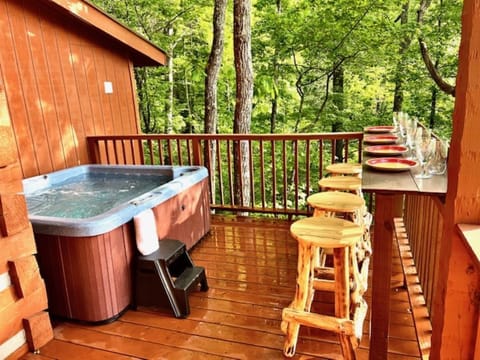 Hot Tub and 4 seats for outdoor dining.