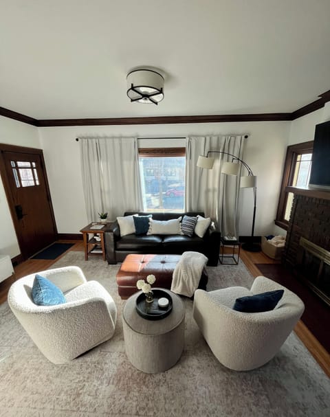 Living room couch opens up into a queen sleeper.