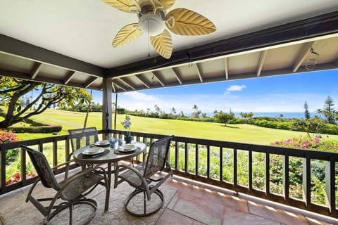 Relax on your private lanai with sweeping views of the lush golf course