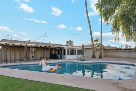 Take a dip in the large sparkling pool in your private, fenced back yard!