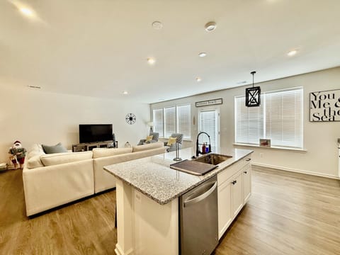 OPEN CONCEPT LIVING & KITCHEN AREA