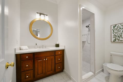 White Guest House Bathroom with Walk-In Shower