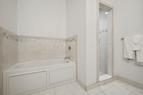 Bolden Guest House Bathroom with Tub and Walk-In Shower