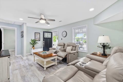 Living room with luxurious leather recliners.