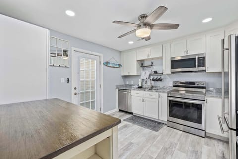 The kitchen is fully equipped with all you need for meal preparation.