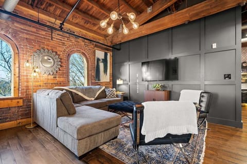 Open concept living room with TV