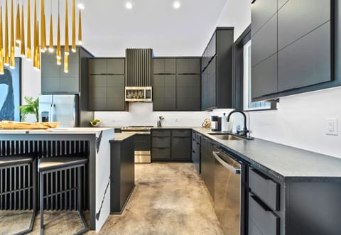 Designed for both function and style, this kitchen features clean lines, modern finishes, and everything you need to prepare meals with ease.