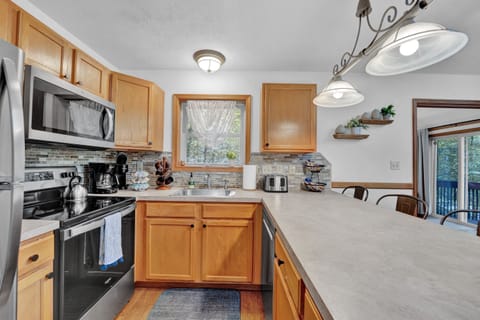 Fully stocked kitchen with stainless appliances
