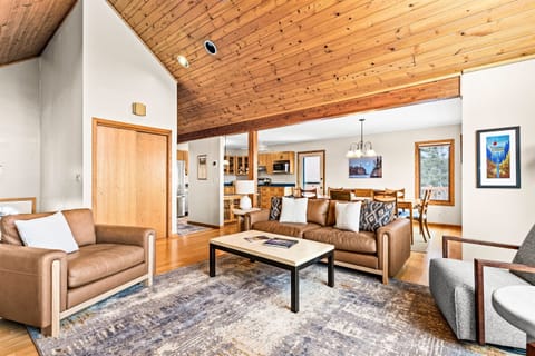 Spacious and functional open-concept living room seamlessly connected to the dining room and kitchen. This thoughtful design fosters togetherness, allowing families to relax, share meals, and enjoy quality time together. 