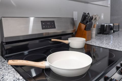 Kitchen stocked with pots and pans