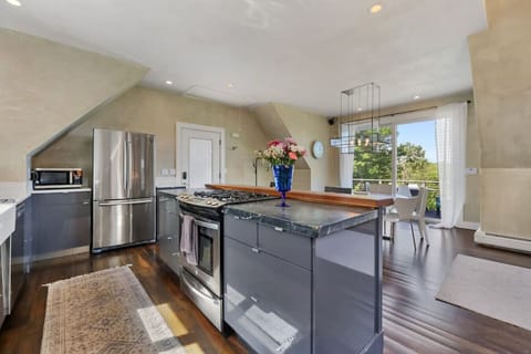 Full kitchen island with gas burner stove and all the necessities to making a great meal!