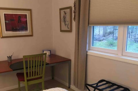 Quiet workspace with a window view perfect for reading or remote work.