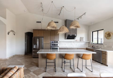 Kitchen | Quartzite Countertops | Stainless Steel Appliances