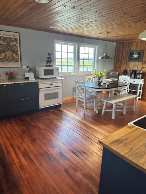 Kitchen big enough for gathering.