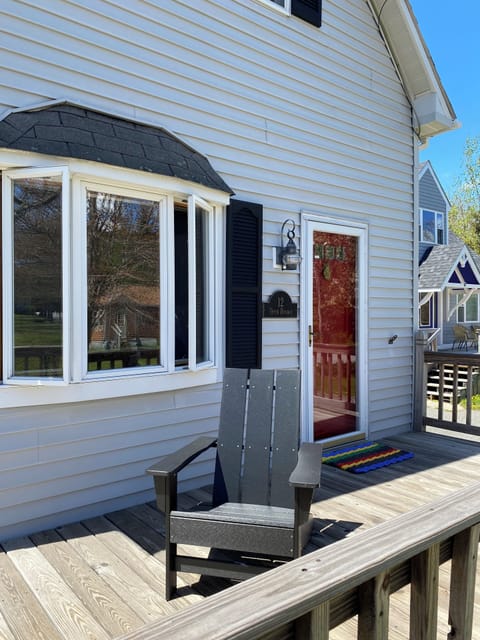 Front Door with wrap around deck and view of Day Mountain