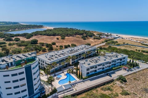 Arial view of apartment complex and beach